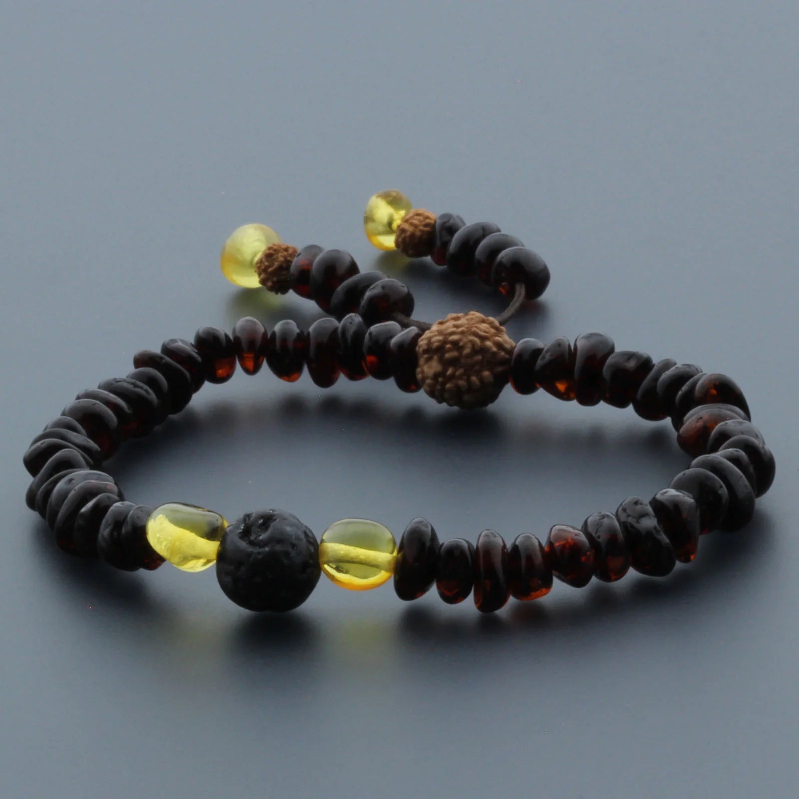 Adult Baltic Amber Bracelet with Lava Stone Mala Tassel. MS03