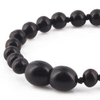 Baltic Amber Teething Bracelet. Baroque Black 5mm - XB54B