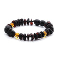 Yellow and black Baltic amber roundel children's bracelet, 15cm